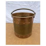 Old copper and brass bucket with handle