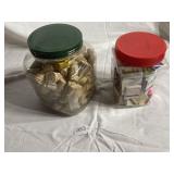 Glass jar with metal lid filled with wine corks an