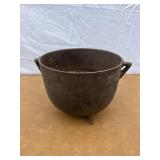 Cast iron footed pot.