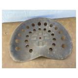 Old metal tractor seat
