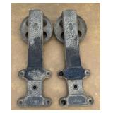Pair of old barn track pulleys. Marked K&B St. Lou