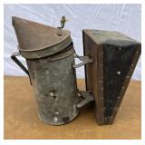Old metal bee smoker