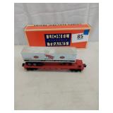 LIONEL RED WING SHOES FLATCAR W/TRAILER,
