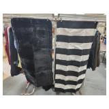 (2) Rugs- 1 All Black Cushioned Rug 47" Long x