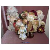 (4) Woodland Santa Clauses -