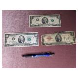 1928 $2 Silver Certificate; (2) 1976 $2 Bills