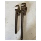 Pipe wrenches. One is Rigid