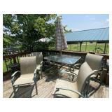 Patio table and 4 chairs and umbrella