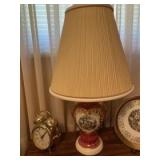 Three Victorian style lamps. One measures 24