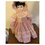 Doll with porcelain head feet and hands