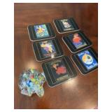 Six coasters and elephant paperweight