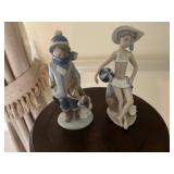 Lladro figurines boy with dog and girl with beach