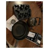 Cast iron skillet can opener and misc