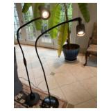Two adjustable floor base reading lights