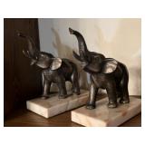 Two elephant figures