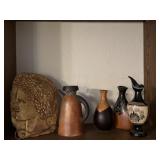 Decor including clay pitcher and three wooden
