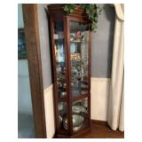Corner curio cabinet with glass shelves. Cabinet