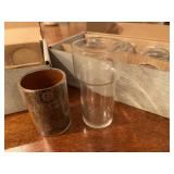 8 glasses. Clear inserts are glass. Outside p