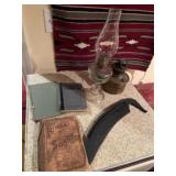 Old lamp, books including Bible songs etc.