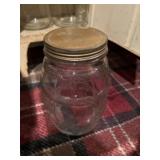 Canning jars and what appears to be old pickle