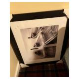 Three pieces of wall art including boats