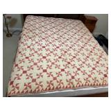 Antique hand made quilt. Shown on queen size bed.