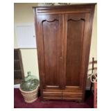 Old wardrobe. Has had a removable shelf placed