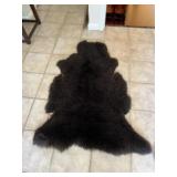 Small black bear rug