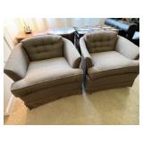 Two small light brown chairs