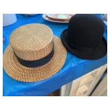 To appear to be vintage hats. Black derby has no