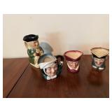 Face pitcher and mugs. Pitcher Tony Wood, mugs