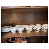 Pheasant tea cups and saucers. 10 cups and 10