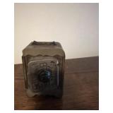 Small antique  bank. Appears to be cast iron and