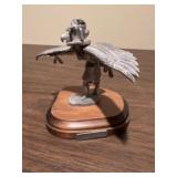 Native American figure stands 5 inches tall