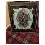 Old window. Appears to be painted glass