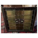 Old window. Appears to be painted glass