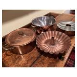 Copper ware pieces. Colander appears to be plated