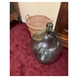 Old green glass wine Jug. Angles in at the bottom