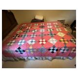 Handmade quilt as some places that are ripped