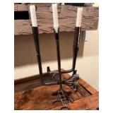 Candle holder made from old branding irons