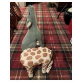 Giraffe stool and paper mache coyote