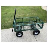 Yard cart. Needs tires aired up