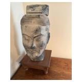 Asian head sculpture