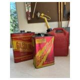 3 gas cans. 2 metal one plastic