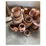 Terra-cotta pots, saucers and Shannon chicks