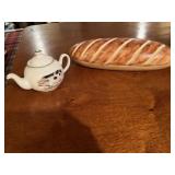 Porcelain pig teapot and bread decor