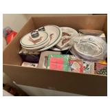 Box of various napkins and paper plates.