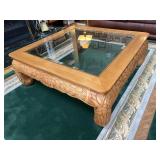Glass topped coffee table