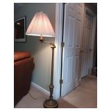 Brass colored floor lamp