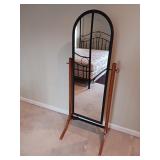 Metal Mirror on stand and black floor lamp metal